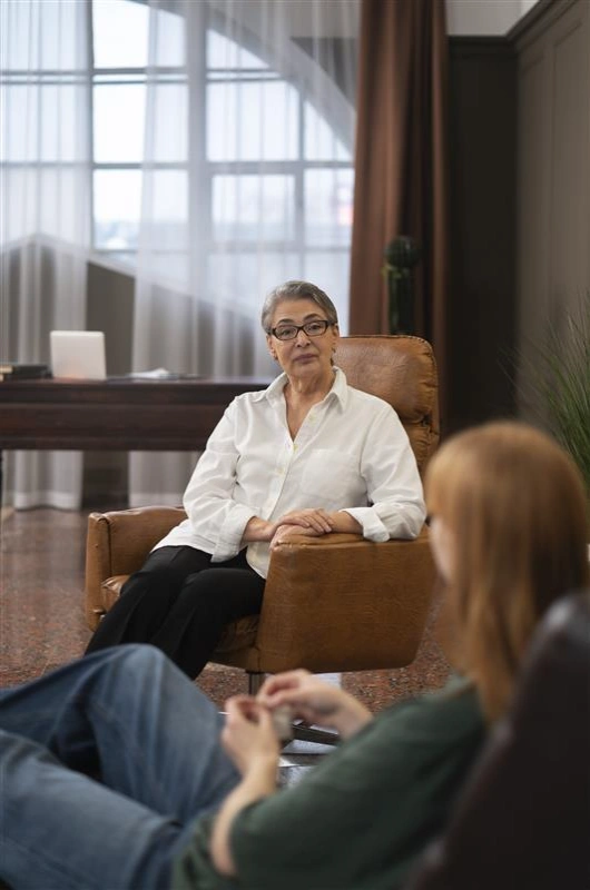 Individual therapy session with therapist and client